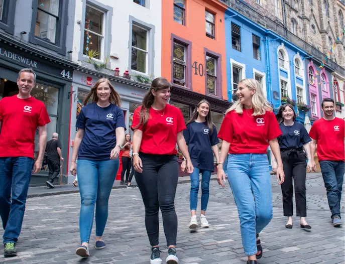 queryclick team dancing in the street